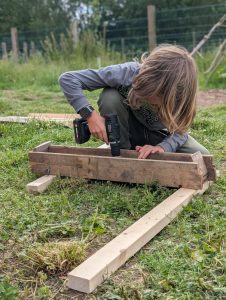 Child making flower box