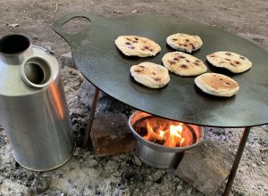 food cooking on campfire scones