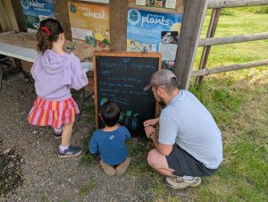 Children preparing shed