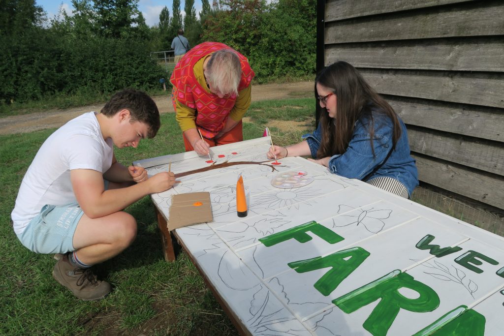 Painting a new FarmEco sign